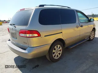 2002 Toyota Sienna LE with VIN 4T3ZF13C72U473555, listed as a IAAI auction lot 42426344 with 330,911 mi miles and . Bid and sale history available at DreamBid. Image 4.