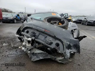 2021 Lotus Evora GT z VIN SCCLMDDN5MHA10403, wystawiony jako Copart lot #52484955 z przebiegiem Nie podano mil oraz Szkody całkowita. Historia ofert i sprzedaży dostępna na DreamBid. Obrazek 5.