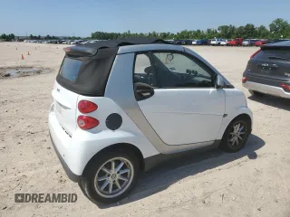 2009 Smart fortwo Passion z VIN WMEEK31X99K257464, wystawiony jako Copart lot #55807575 z przebiegiem 49 851 mil mil oraz Tytuł czysty. Historia ofert i sprzedaży dostępna na DreamBid. Obrazek 3.