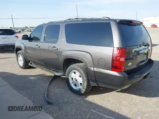 2011 Chevrolet Suburban LT with VIN 1GNSKJE34BR242629, listed as a IAAI auction lot 42043276 with 197,722 mi miles. Bid and sale history available at carsss.com. Image 3.