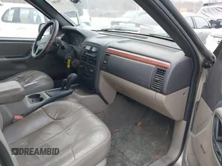 1999 Jeep Grand Cherokee Laredo с VIN 1J4GW58N4XC676836, выставлен на аукционе IAAI как лот 41799381 с пробегом 203 784 миль миль и . История ставок и продаж доступна на DreamBid. Изображение 5.