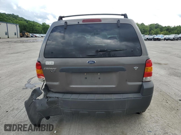 2006 Ford Escape XLT with VIN 1FMYU03136KD47701, listed as a Copart auction lot 58008695 with 176,341 mi miles and Salvage title. Bid and sale history available at DreamBid. Image 6.