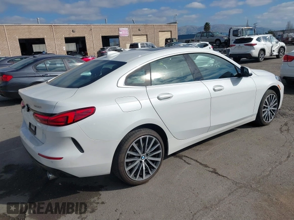 2021 BMW 2 Series 228i with VIN WBA53AK08M7J17741, listed as a IAAI auction lot 41458355 with 31,649 mi miles. Bid and sale history available at carsss.com. Image 4.