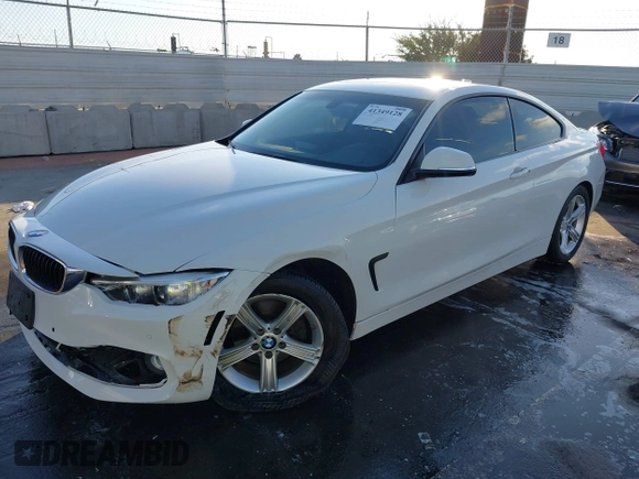 2014 BMW 4 Series 428i with VIN WBA3N7C50EF718812, listed as a IAAI auction lot 41349128 with 67,581 mi miles and . Bid and sale history available at carsss.com. Image 17.