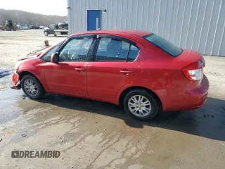 2012 Suzuki SX4 LE z VIN JS2YC5A34C6300969, wystawiony jako Copart lot #49036095 z przebiegiem 163 367 mil mil oraz Szkoda całkowita • Salvage title. Historia ofert i sprzedaży dostępna na DreamBid. Obrazek 2.