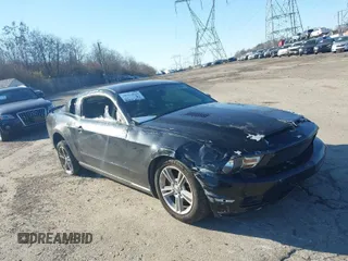 2010 Ford Mustang V6 with VIN 1ZVBP8AN1A5146809, listed as a IAAI auction lot 38354821 with 183,044 mi miles. Bid and sale history available at carsss.com. Image 1.