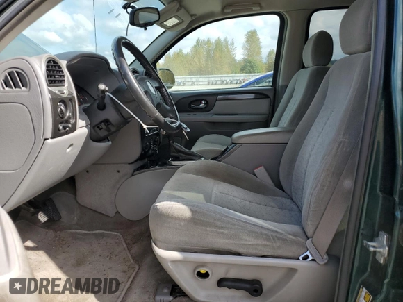 2005 GMC Envoy SLT with VIN 1GKDT13S952144349, listed as a Copart auction lot 71800694 with 137,614 mi miles and Salvage Title. Bid and sale history available at DreamBid. Image 7.