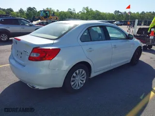 2012 Suzuki Kizashi S with VIN JS2RF9A12C6100223, listed as a IAAI auction lot 42028125 with 114,280 mi miles. Bid and sale history available at carsss.com. Image 4.