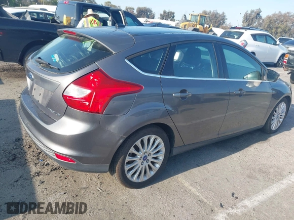 2012 Ford Focus Titanium with VIN 1FAHP3N22CL200249, listed as a IAAI auction lot 42149873 with 103,805 mi miles and . Bid and sale history available at carsss.com. Image 4.