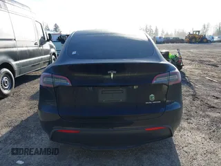 2023 Tesla Model Y Long Range z VIN 7SAYGDEE9PF637042, wystawiony jako IAAI lot #41969086 z przebiegiem 25 524 mil mil oraz . Historia ofert i sprzedaży dostępna na DreamBid. Obrazek 16.