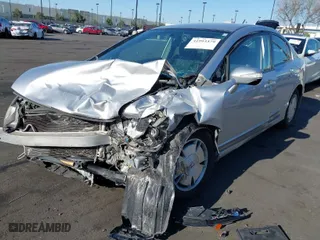 2010 Honda Civic Hybrid with VIN JHMFA3F24AS000539, listed as a IAAI auction lot 41993379 with 1 mi miles. Bid and sale history available at carsss.com. Image 2.