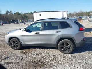 2017 Jeep Cherokee Sport with VIN 1C4PJLAB4HW603099, listed as a IAAI auction lot 41663602 with 150,662 mi miles. Bid and sale history available at carsss.com. Image 15.