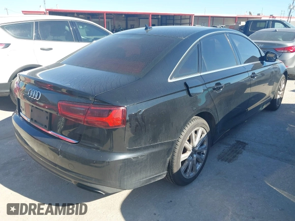 2016 Audi A6 2.0T Premium with VIN WAUCFAFC7GN048396, listed as a IAAI auction lot 41668956 with 169,312 mi miles. Bid and sale history available at carsss.com. Image 4.
