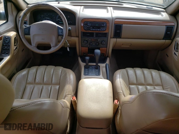 1999 Jeep Grand Cherokee Limited with VIN 1J4GW68S5XC573162, listed as a Copart auction lot 78611274 with 174,960 mi miles and Salvage Title. Bid and sale history available at carsss.com. Image 8.