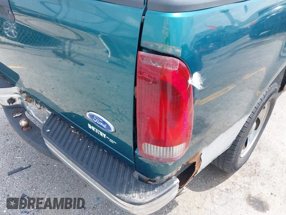 1997 Ford F-150 with VIN 1FTDF1722VNB40056, listed as a IAAI auction lot 42502044 with 155,836 mi miles and . Bid and sale history available at DreamBid. Image 15.