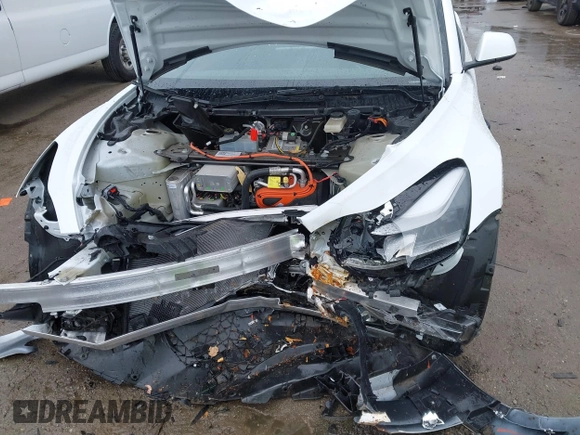 2023 Tesla Model 3 with VIN 5YJ3E1EA6PF432397, listed as a IAAI auction lot 41760895 with 15,692 mi miles and . Bid and sale history available at DreamBid. Image 6.