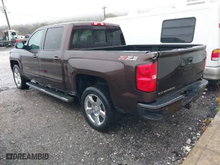 2016 Chevrolet Silverado 1500 LT with VIN 3GCUKREC1GG197043, listed as a IAAI auction lot 41953001 with 181,124 mi miles. Bid and sale history available at carsss.com. Image 3.