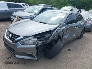 2017 Nissan Altima SV z VIN 1N4AL3AP4HC266324, wystawiony jako IAAI lot #42170025 z przebiegiem 127 595 mil mil oraz . Historia ofert i sprzedaży dostępna na DreamBid. Obrazek 17.