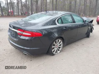 2014 Jaguar XF V6 SC with VIN SAJWJ0EF9E8U12853, listed as a IAAI auction lot 41780409 with 138,329 mi miles. Bid and sale history available at carsss.com. Image 4.
