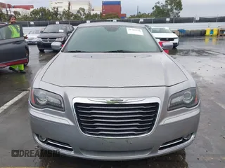 2013 Chrysler 300 with VIN 2C3CCABG3DH736120, listed as a IAAI auction lot 41765794 with 126,268 mi miles. Bid and sale history available at carsss.com. Image 12.