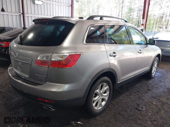 2011 Mazda CX-9 Touring with VIN JM3TB3CV6B0307358, listed as a IAAI auction lot 41979197 with 128,471 mi miles. Bid and sale history available at carsss.com. Image 4.
