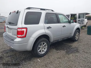 2008 Ford Escape XLT with VIN 1FMCU93108KB75838, listed as a IAAI auction lot 41040911 with 205,049 mi miles. Bid and sale history available at carsss.com. Image 4.