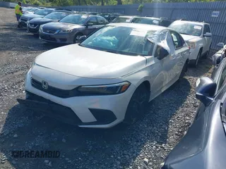 2023 Honda Civic Sport with VIN 2HGFE2F54PH512362, listed as a IAAI auction lot 41401479 with 12,672 mi miles and . Bid and sale history available at DreamBid. Image 17.