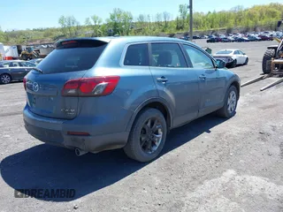 2014 Mazda CX-9 Touring with VIN JM3TB3CV1E0447130, listed as a IAAI auction lot 40815387 with 148,985 mi miles. Bid and sale history available at carsss.com. Image 4.