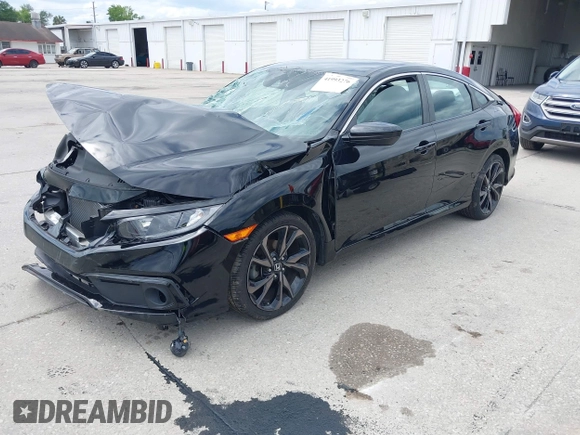2019 Honda Civic Sport with VIN 19XFC2F85KE015159, listed as a IAAI auction lot 41993276 with 82,542 mi miles and . Bid and sale history available at DreamBid. Image 18.
