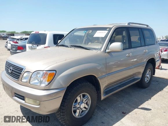 2001 Lexus LX 470 with VIN JTJHT00W613510736, listed as a IAAI auction lot 42005639 with 274,227 mi miles and . Bid and sale history available at carsss.com. Image 6.