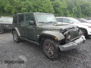 2007 Jeep Wrangler Unlimited Sahara с VIN 1J4GA59107L141710, выставлен на аукционе Copart как лот 59939755 с пробегом 212 659 миль миль и Списание • Salvage title. История ставок и продаж доступна на DreamBid. Изображение 4.