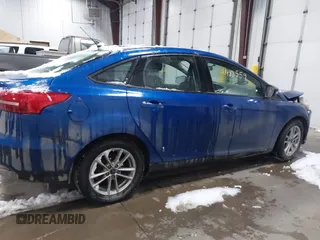 2018 Ford Focus SE z VIN 1FADP3F26JL312725, wystawiony jako IAAI lot #41488559 z przebiegiem 30 686 mil mil oraz . Historia ofert i sprzedaży dostępna na DreamBid. Obrazek 13.