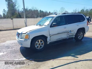 2002 GMC Envoy SLT with VIN 1GKDS13S622507379, listed as a IAAI auction lot 41641163 with 201,089 mi miles. Bid and sale history available at carsss.com. Image 2.