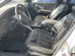 1996 Infiniti Q45 z VIN JNKNG01D1TM404004, wystawiony jako Copart lot #54433905 z przebiegiem 157 775 mil mil oraz Nie do naprawy. Historia ofert i sprzedaży dostępna na DreamBid. Obrazek 7.