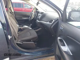 2014 Dodge Journey SE Plus with VIN 3C4PDCAB2ET149735, listed as a IAAI auction lot 41928241 with 150,348 mi miles and . Bid and sale history available at DreamBid. Image 5.