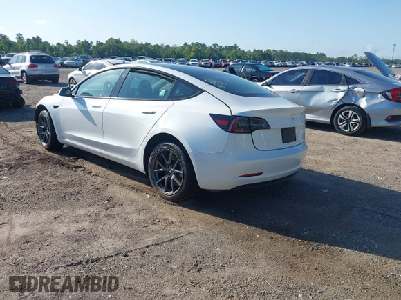 2023 Tesla Model 3 with VIN 5YJ3E1EA9PF557880, listed as a IAAI auction lot 42481413 with 40,582 mi miles and . Bid and sale history available at DreamBid. Image 3.