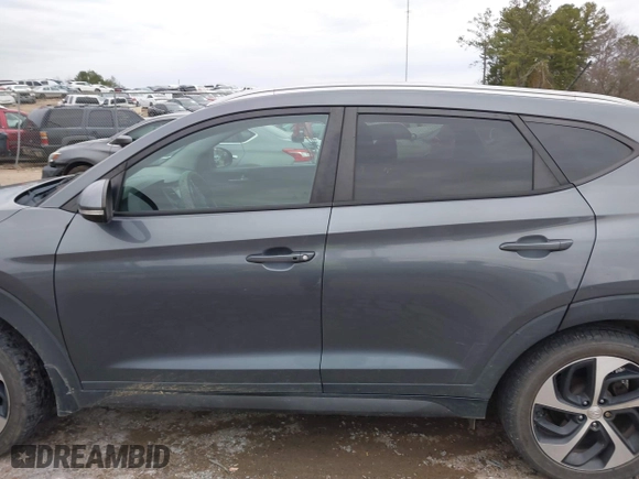 2016 Hyundai Tucson Sport with VIN KM8J33A21GU254828, listed as a IAAI auction lot 41297692 with 134,394 mi miles. Bid and sale history available at carsss.com. Image 14.