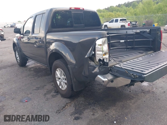 2015 Nissan Frontier SV with VIN 1N6AD0EV6FN751948, listed as a IAAI auction lot 42063935 with 52,244 mi miles and . Bid and sale history available at DreamBid. Image 3.