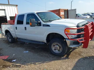 2015 Ford Super Duty F-250 SRW Lariat with VIN 1FT7W2B68FEA46052, listed as a IAAI auction lot 41203769 with 198,044 mi miles. Bid and sale history available at carsss.com. Image 1.