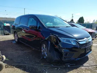 2018 Honda Odyssey EX-L with VIN 5FNRL6H71JB004550, listed as a IAAI auction lot 42053063 with 167,733 mi miles. Bid and sale history available at carsss.com. Image 1.
