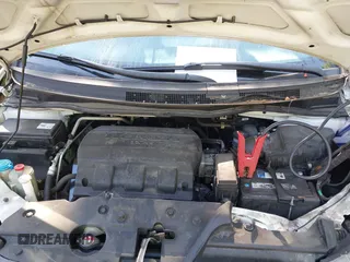 2014 Honda Odyssey EX-L with VIN 5FNRL5H63EB064854, listed as a IAAI auction lot 42102704 with 148,536 mi miles and . Bid and sale history available at carsss.com. Image 10.