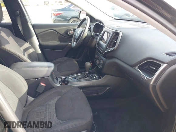 2019 Jeep Cherokee Latitude with VIN 1C4PJLCB8KD215423, listed as a IAAI auction lot 41911882 with 76,965 mi miles. Bid and sale history available at carsss.com. Image 5.
