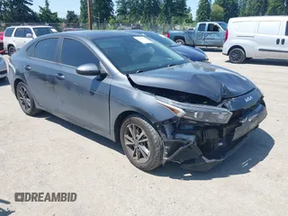 2022 Kia Forte LXS z VIN 3KPF24AD2NE502195, wystawiony jako IAAI lot #42422437 z przebiegiem 63 064 mil mil oraz . Historia ofert i sprzedaży dostępna na DreamBid. Obrazek 1.