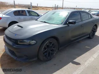 2022 Dodge Charger R/T with VIN 2C3CDXCT4NH231930, listed as a IAAI auction lot 41789157 with 63,428 mi miles. Bid and sale history available at carsss.com. Image 2.