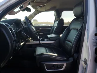 2019 Ram 1500 Laramie with VIN 1C6SRFDTXKN674871, listed as a Copart auction lot 77143314 with 30,418 mi miles and Salvage Title. Bid and sale history available at carsss.com. Image 7.
