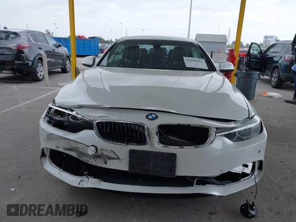 2015 BMW 4 Series 428i with VIN WBA3V7C5XFP772663, listed as a IAAI auction lot 42101012 with 75,901 mi miles and . Bid and sale history available at DreamBid. Image 12.