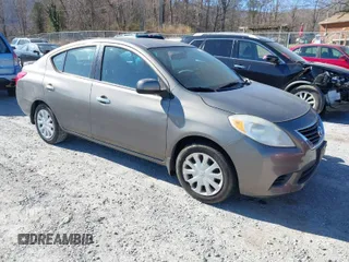2014 Nissan Versa S with VIN 3N1CN7AP5EK451432, listed as a IAAI auction lot 41818916 with 126,190 mi miles. Bid and sale history available at carsss.com. Image 1.