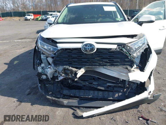 2019 Toyota RAV4 XLE Premium with VIN JTMA1RFV9KD013771, listed as a IAAI auction lot 42055558 with 36,585 mi miles. Bid and sale history available at carsss.com. Image 6.