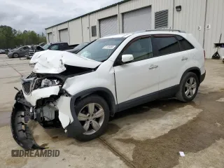 2012 Kia Sorento EX with VIN 5XYKU3A62CG244197, listed as a Copart auction lot 51104485 with 141,607 mi miles and Salvage title. Bid and sale history available at DreamBid. Image 1.