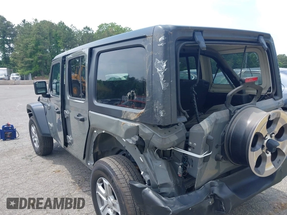2020 Jeep Wrangler Unlimited Black and Tan with VIN 1C4HJXDG3LW298223, listed as a IAAI auction lot 42446032 with 17,688 mi miles and . Bid and sale history available at DreamBid. Image 3.